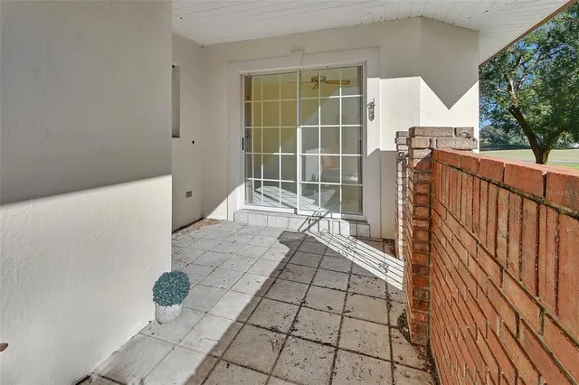 a view of entryway with wooden floor and fence