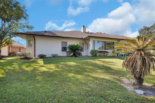 a house view with a garden space