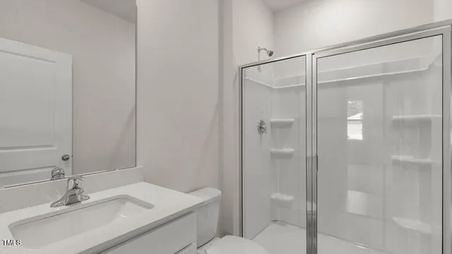 a bathroom with a sink and mirror