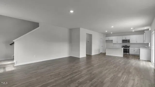 a view of kitchen with wooden floor