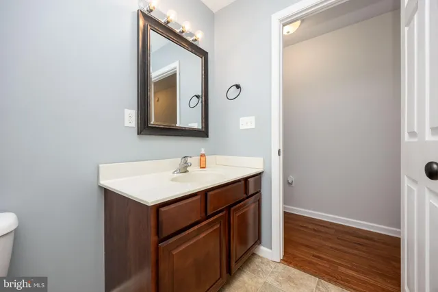 a bathroom with a toilet and a bathtub