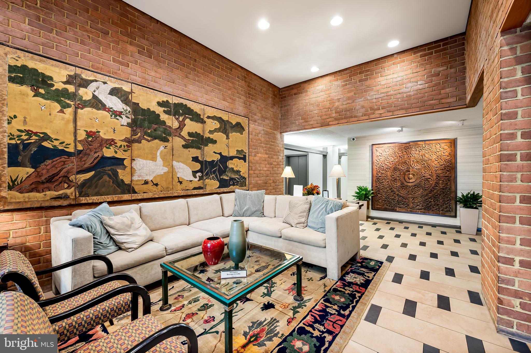 111 Hamlet Hill Road, Unit 1113 Baltimore, MD 21210 - Photo 21 of 27 a living room with furniture and a flat screen tv