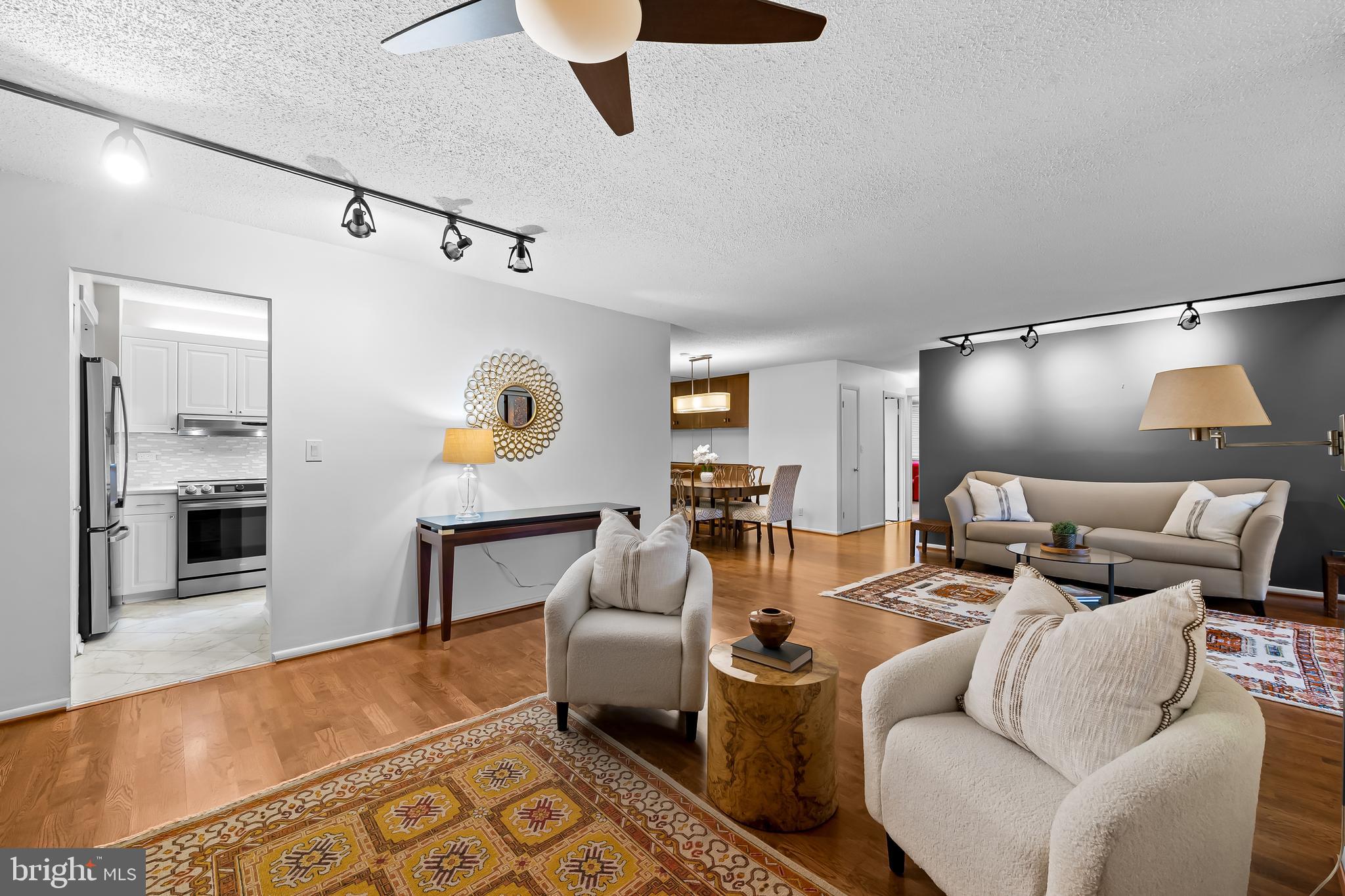 111 Hamlet Hill Road, Unit 1113 Baltimore, MD 21210 - Photo 27 of 27 a living room with furniture and a table