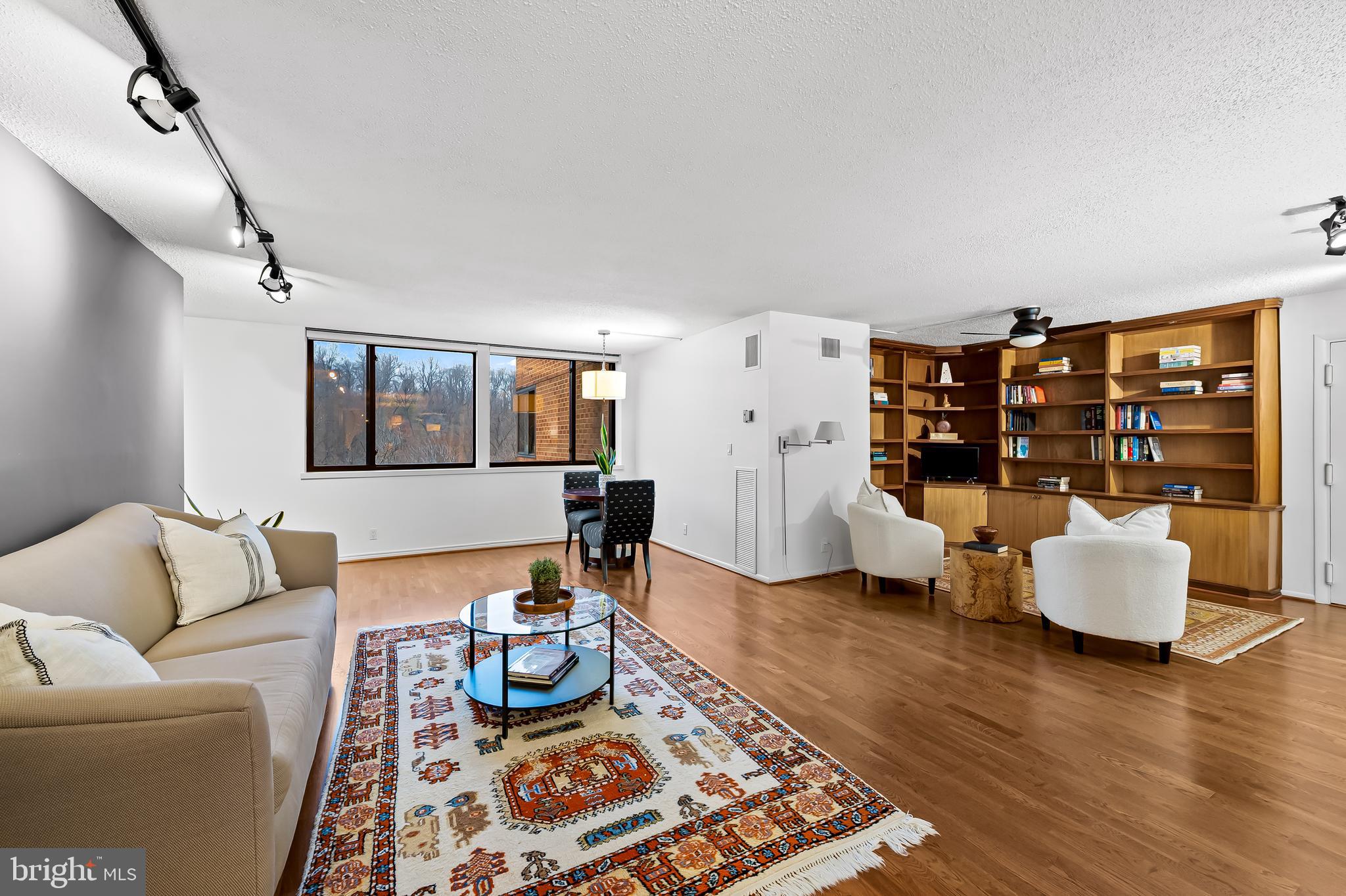 111 Hamlet Hill Road, Unit 1113 Baltimore, MD 21210 - Photo 4 of 27 a living room with furniture and wooden floor