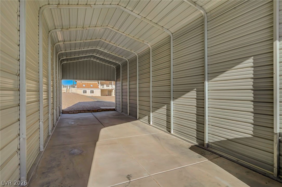 640 North Racetrack Road Henderson, NV 89015 - Photo 16 of 65 Secure covered RV parking, providing ample protection for vehicles.