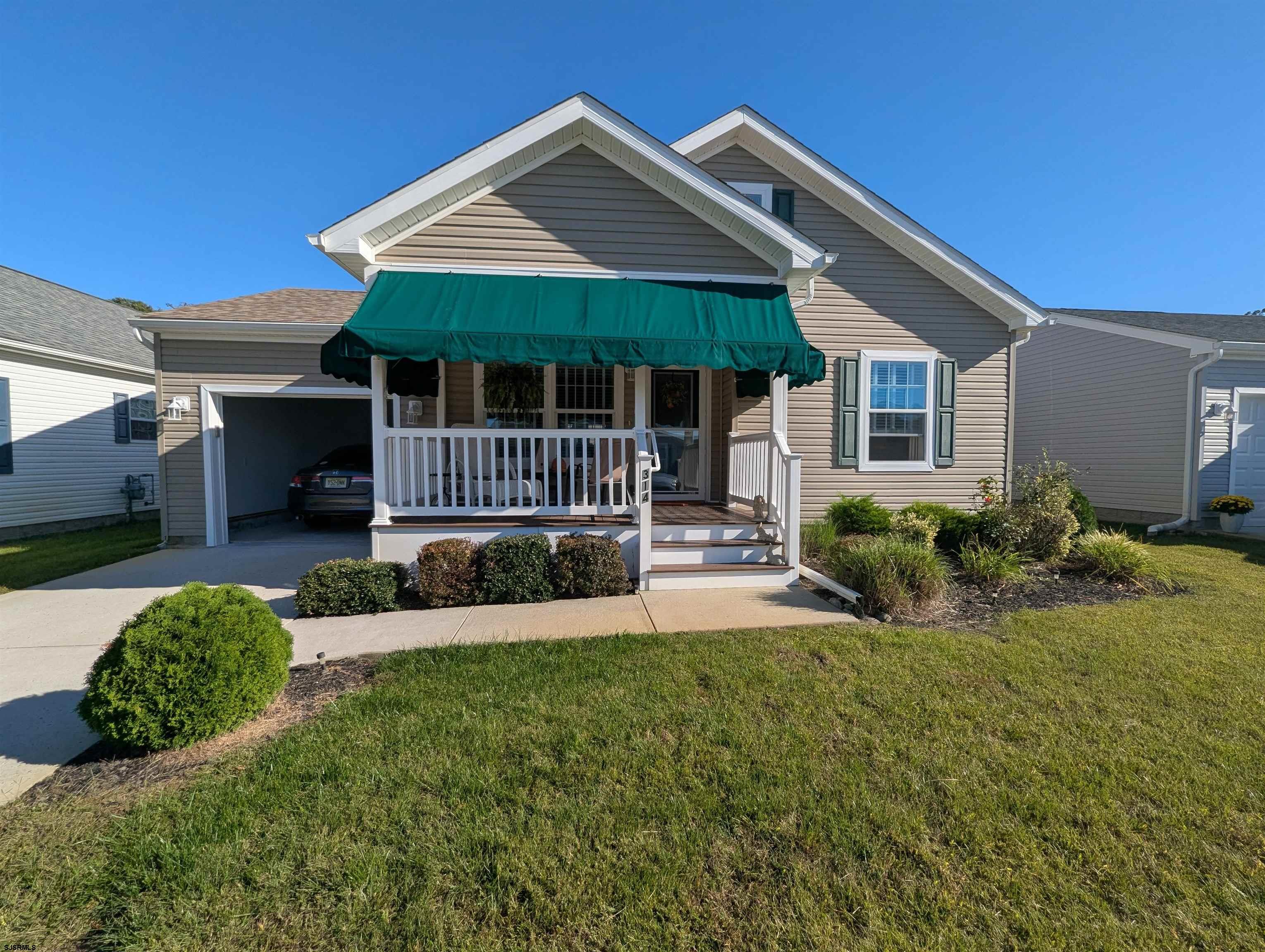 2058 Shore Road Seaville, NJ 08230 - Photo 1 of 29 a front view of a house with a yard