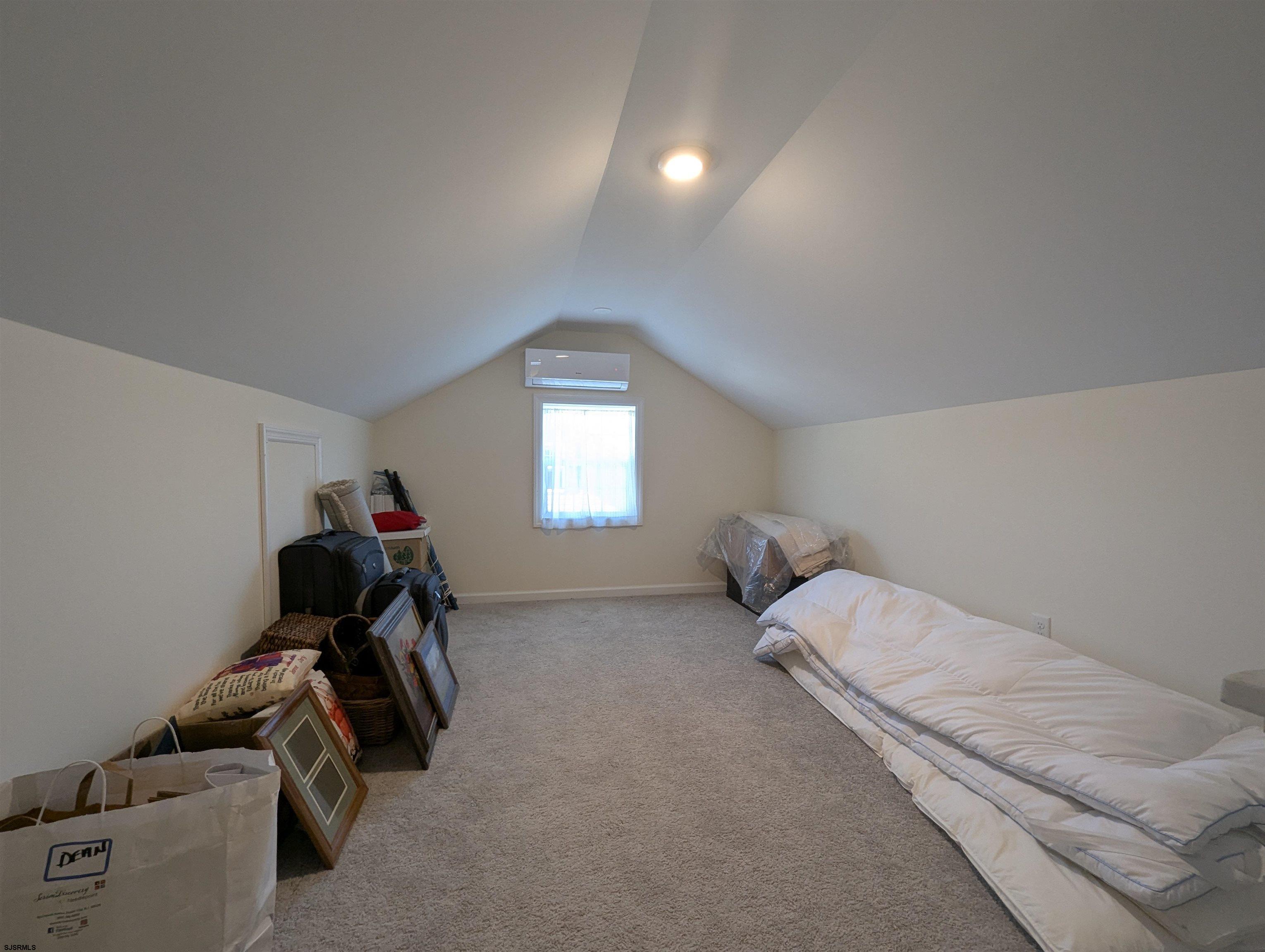 2058 Shore Road Seaville, NJ 08230 - Photo 20 of 29 a bed room with a bed and a tv