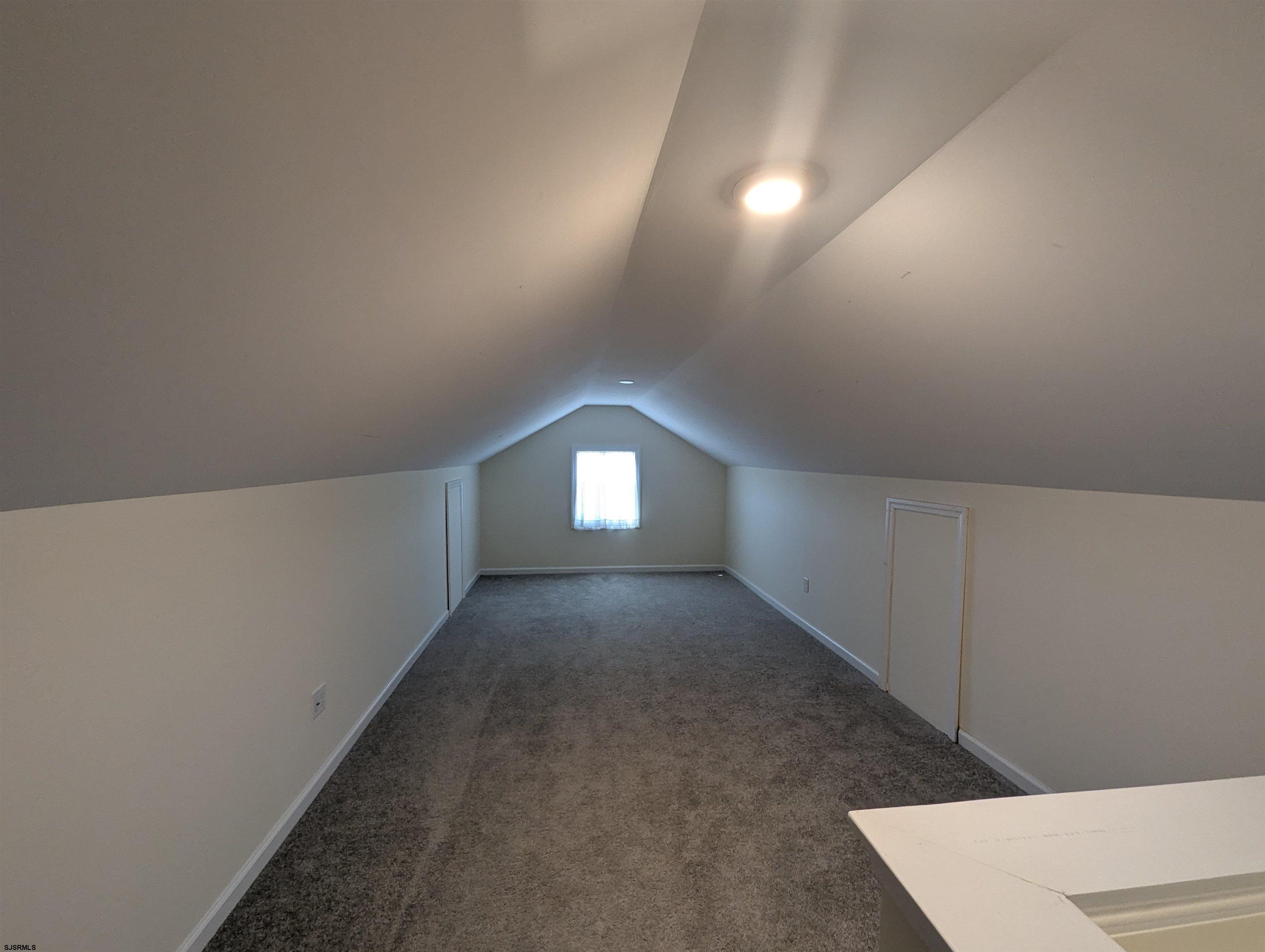 2058 Shore Road Seaville, NJ 08230 - Photo 21 of 29 a view of an empty room with wooden floor and a window