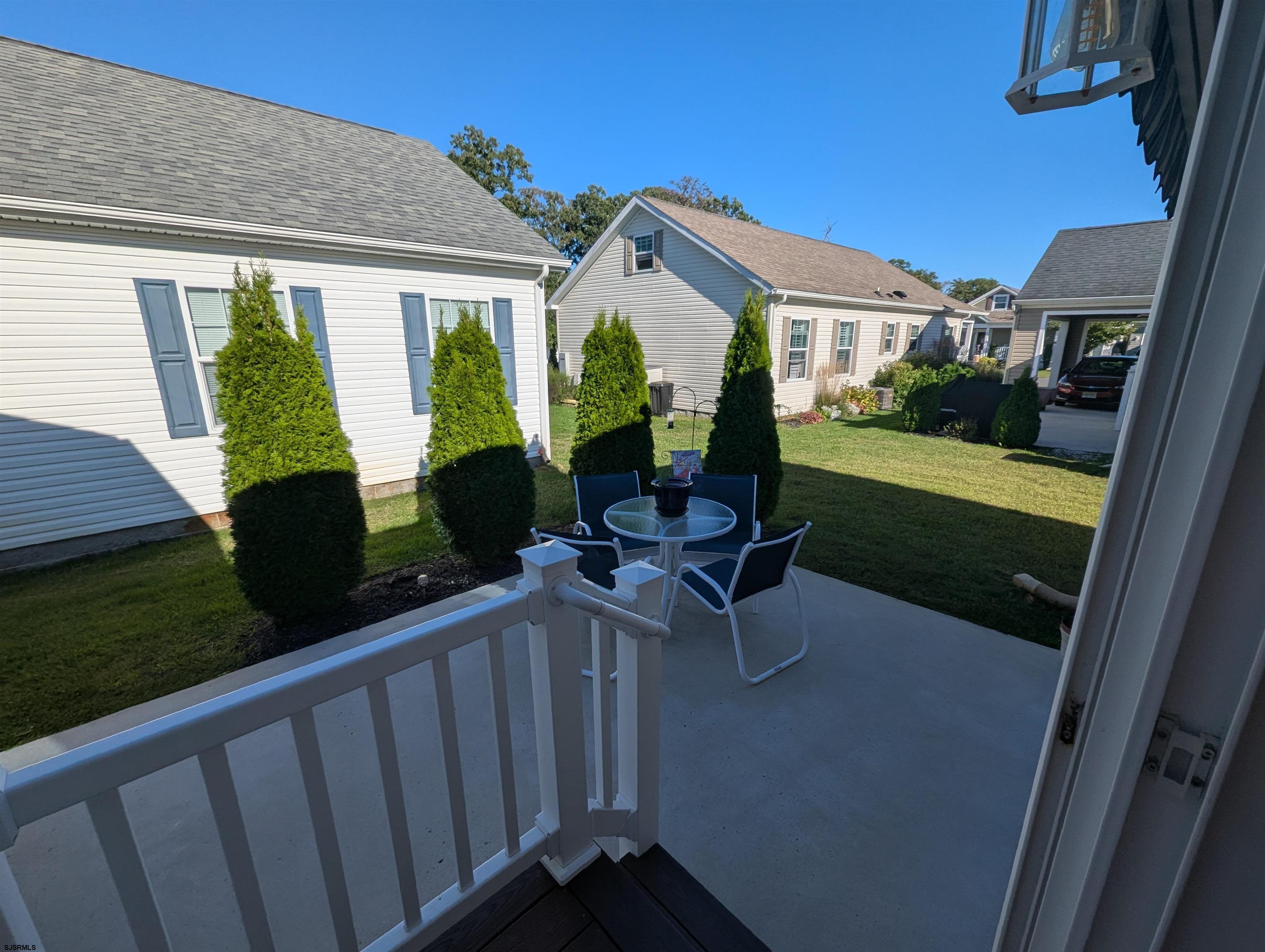 2058 Shore Road Seaville, NJ 08230 - Photo 26 of 29 a view of a house with backyard porch and sitting area