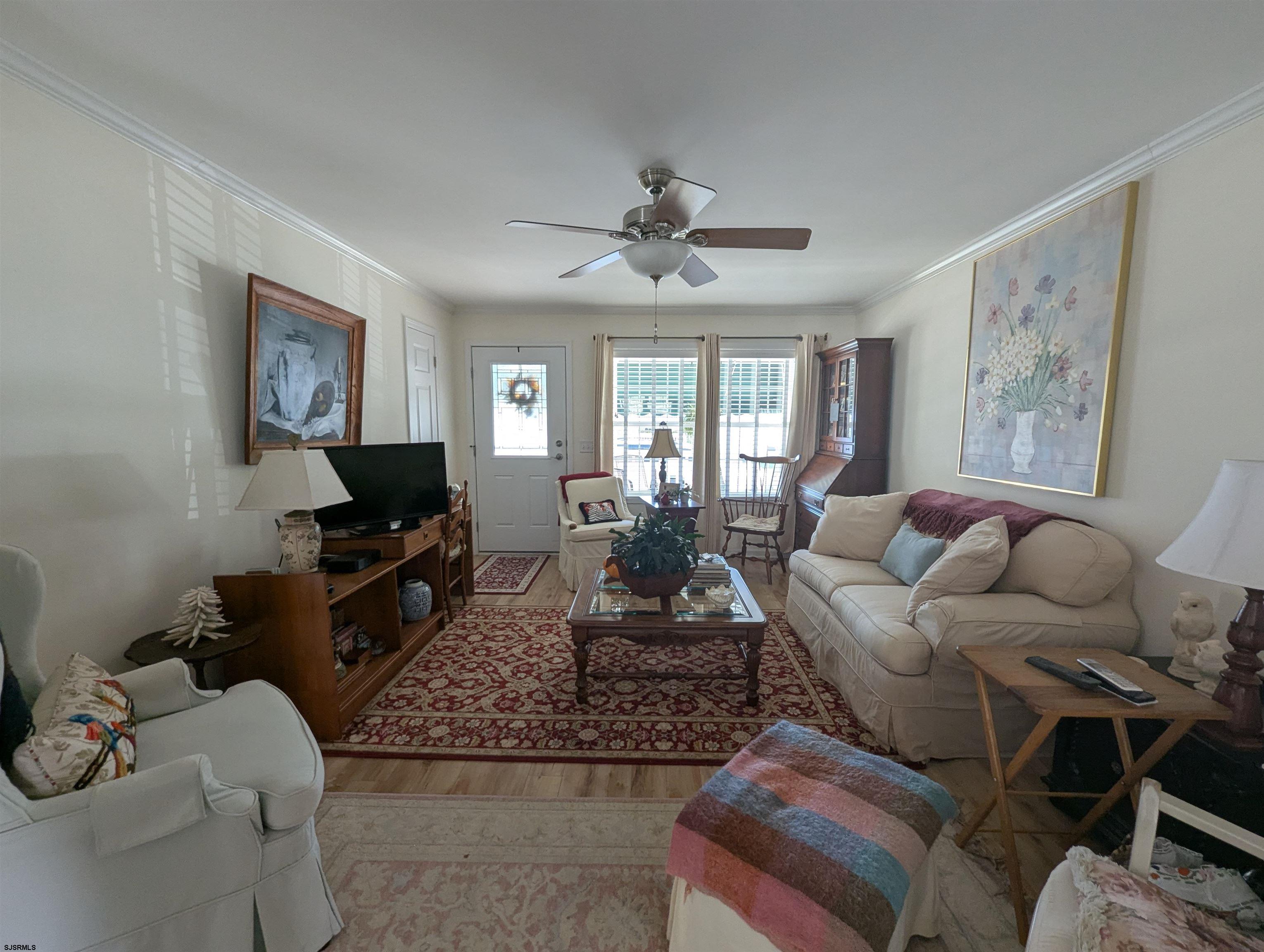 2058 Shore Road Seaville, NJ 08230 - Photo 4 of 29 a living room with furniture and a flat screen tv