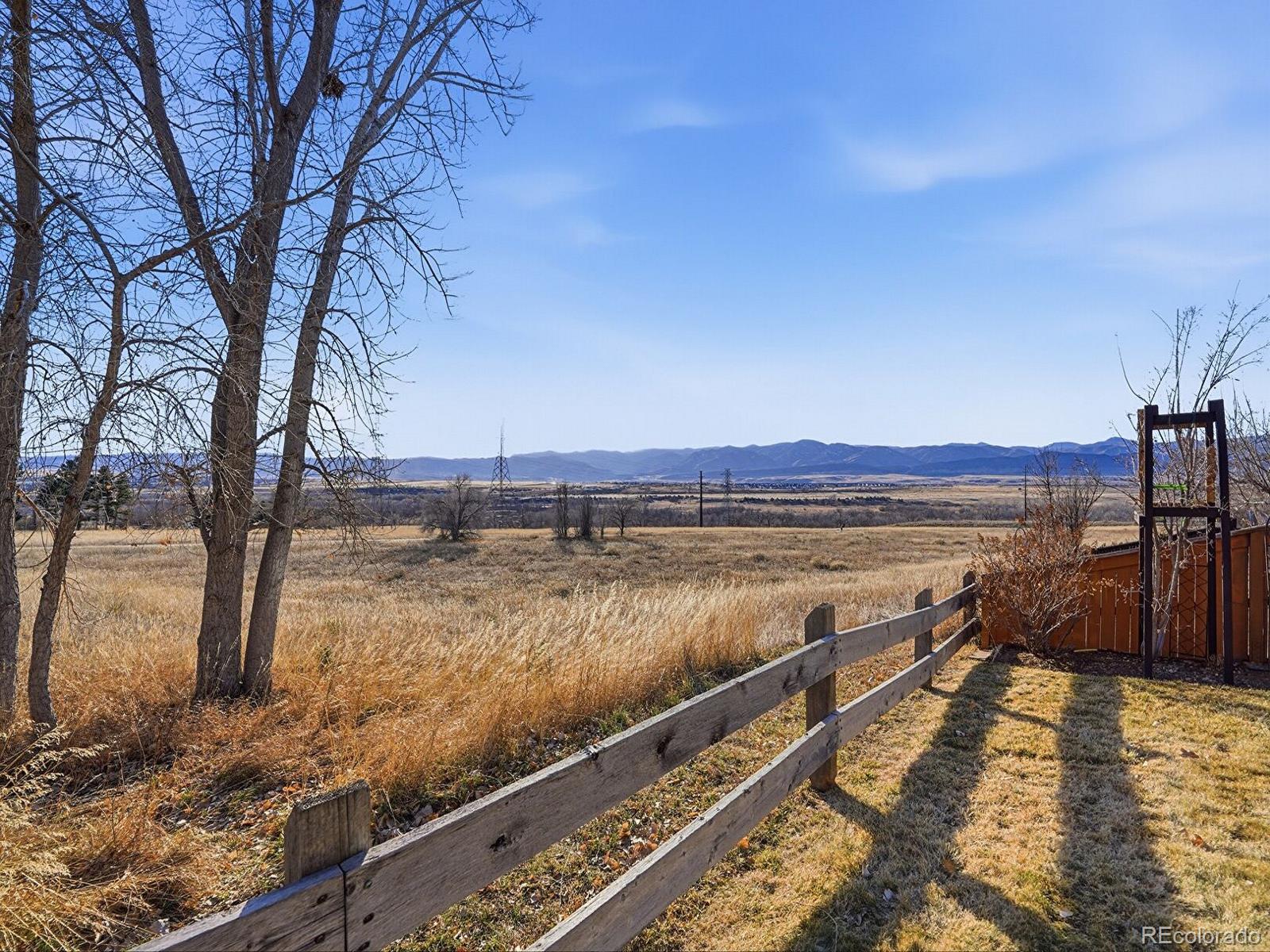 3308 Oak Leaf Place Highlands Ranch, CO 80129 - Photo 2 of 50 a view of mountain with lake view