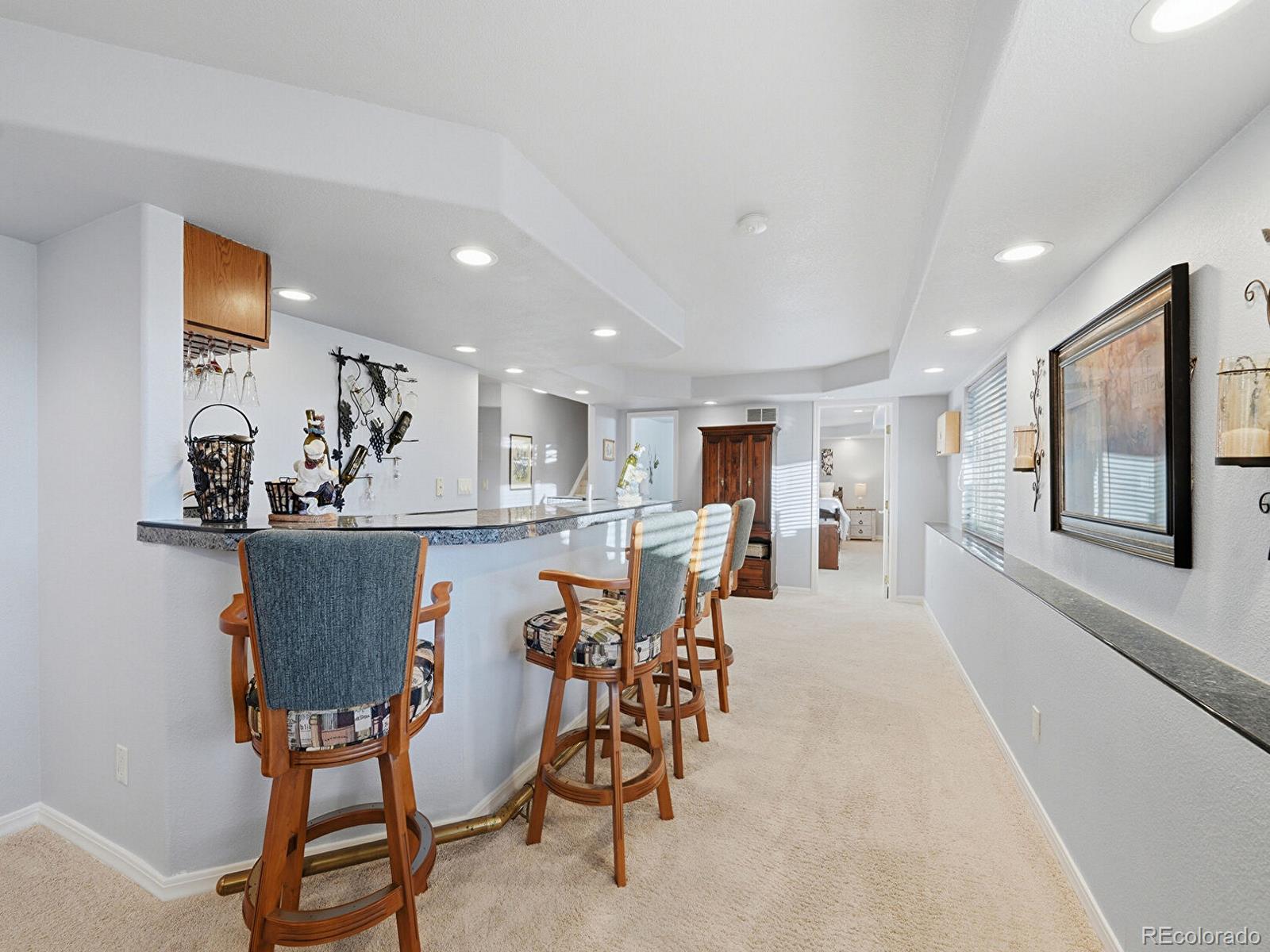 3308 Oak Leaf Place Highlands Ranch, CO 80129 - Photo 26 of 50 a view of a dining room with furniture