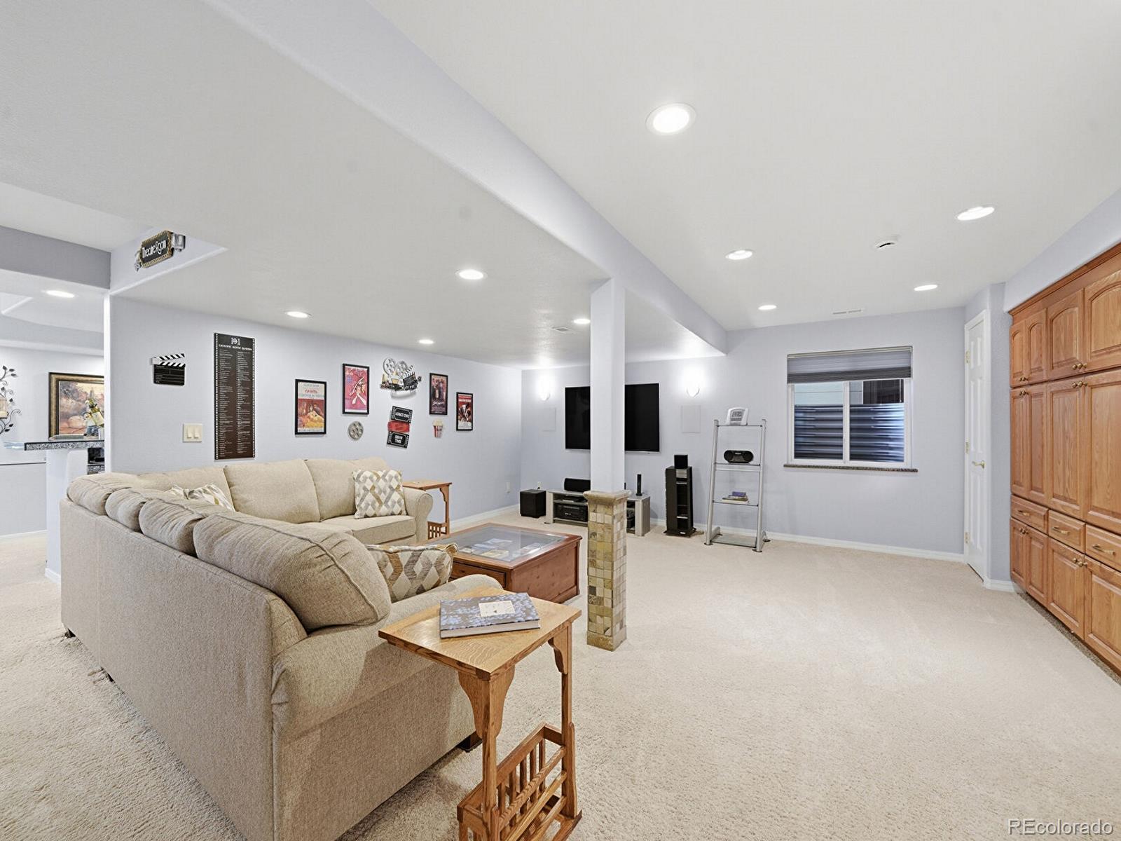 3308 Oak Leaf Place Highlands Ranch, CO 80129 - Photo 28 of 50 a living room with furniture and a window