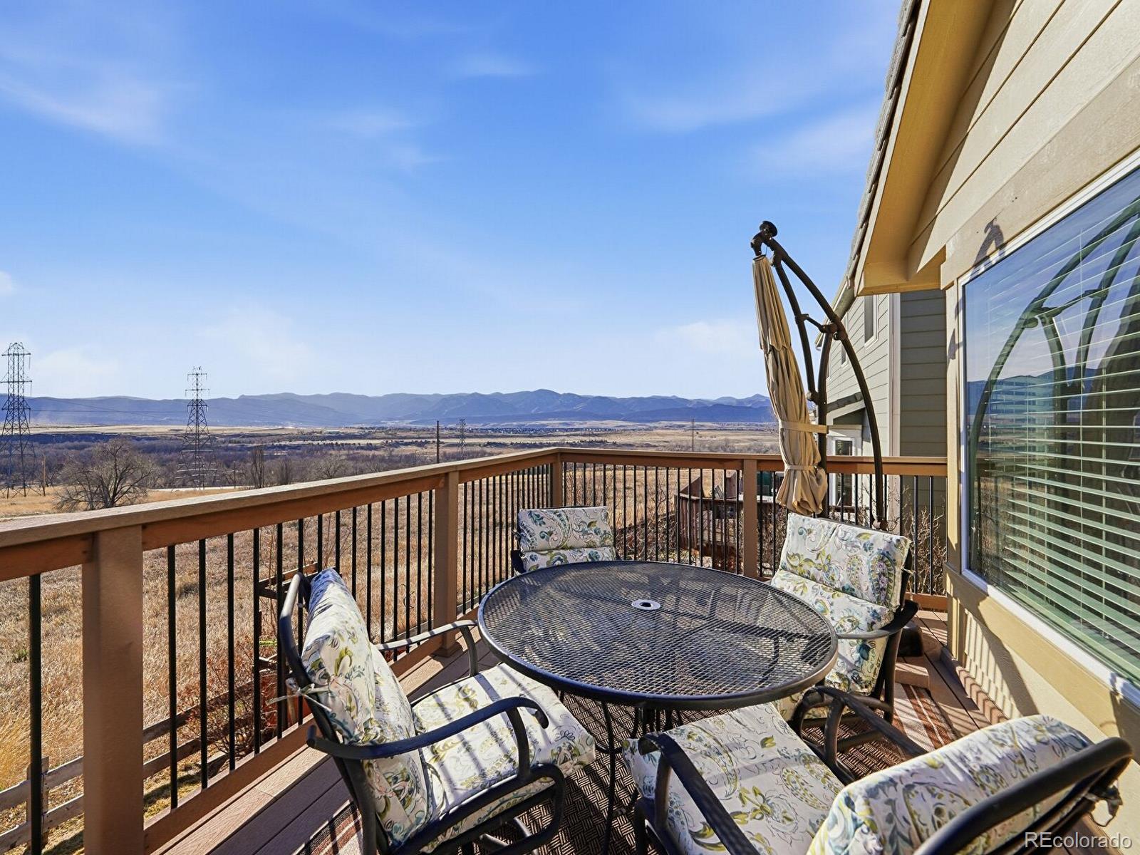 3308 Oak Leaf Place Highlands Ranch, CO 80129 - Photo 37 of 50 a view of a balcony with furniture