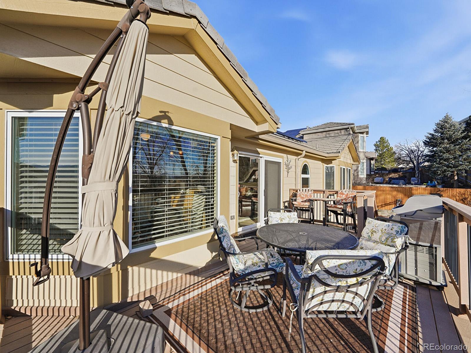 3308 Oak Leaf Place Highlands Ranch, CO 80129 - Photo 38 of 50 a view of a patio with couches table and chairs
