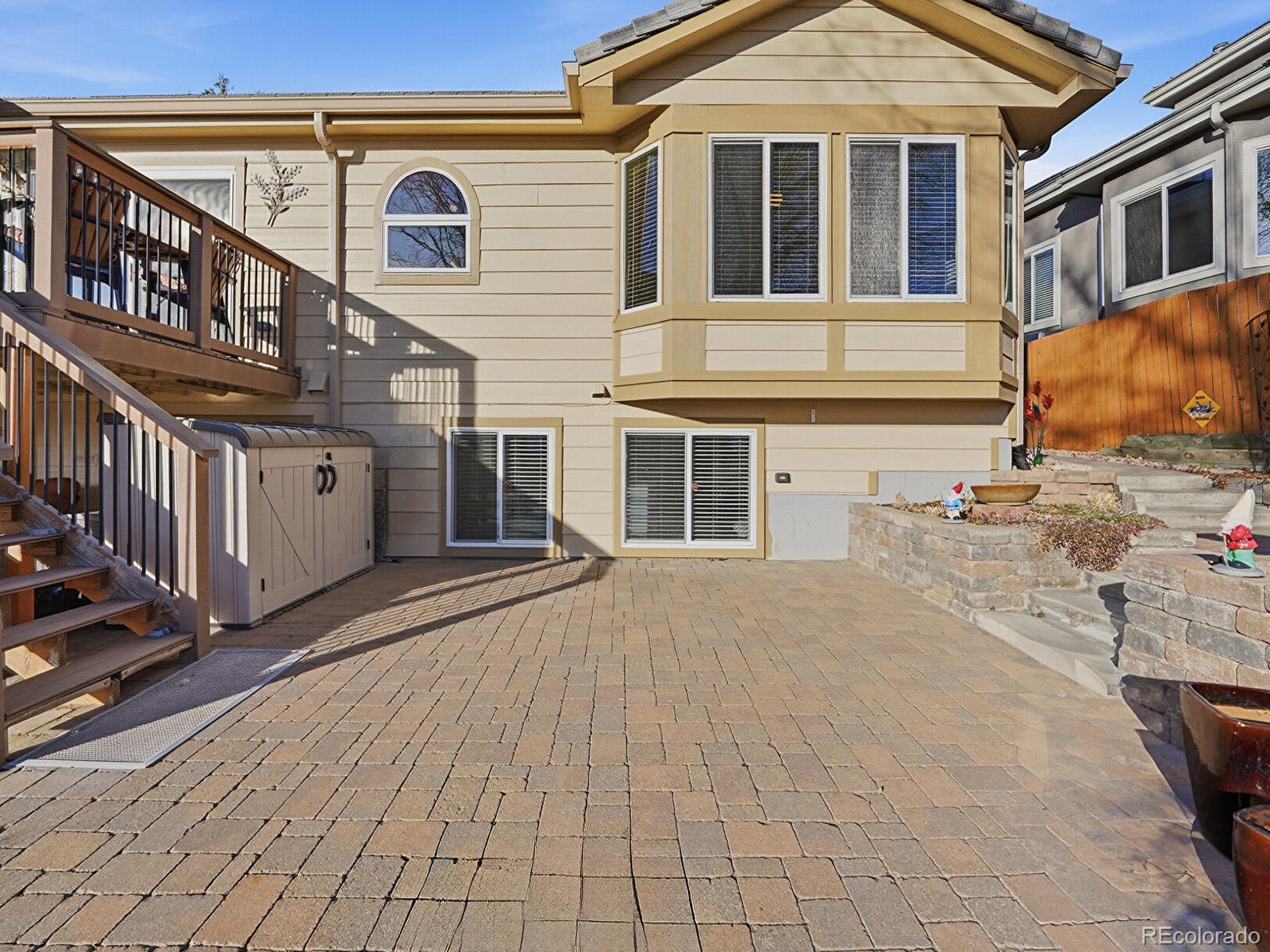 3308 Oak Leaf Place Highlands Ranch, CO 80129 - Photo 40 of 50 a view of a house with a flat tv screen