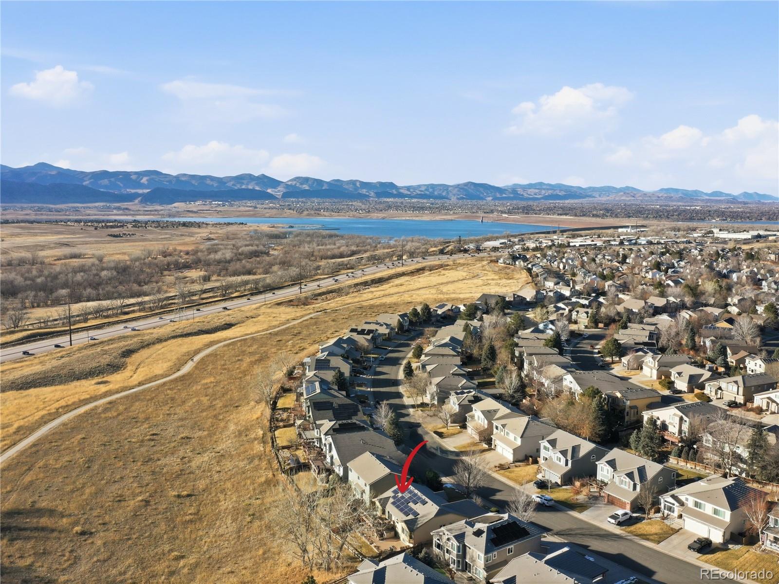 3308 Oak Leaf Place Highlands Ranch, CO 80129 - Photo 44 of 50 an aerial view of residential building and ocean