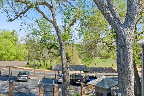 a view of yard from a balcony