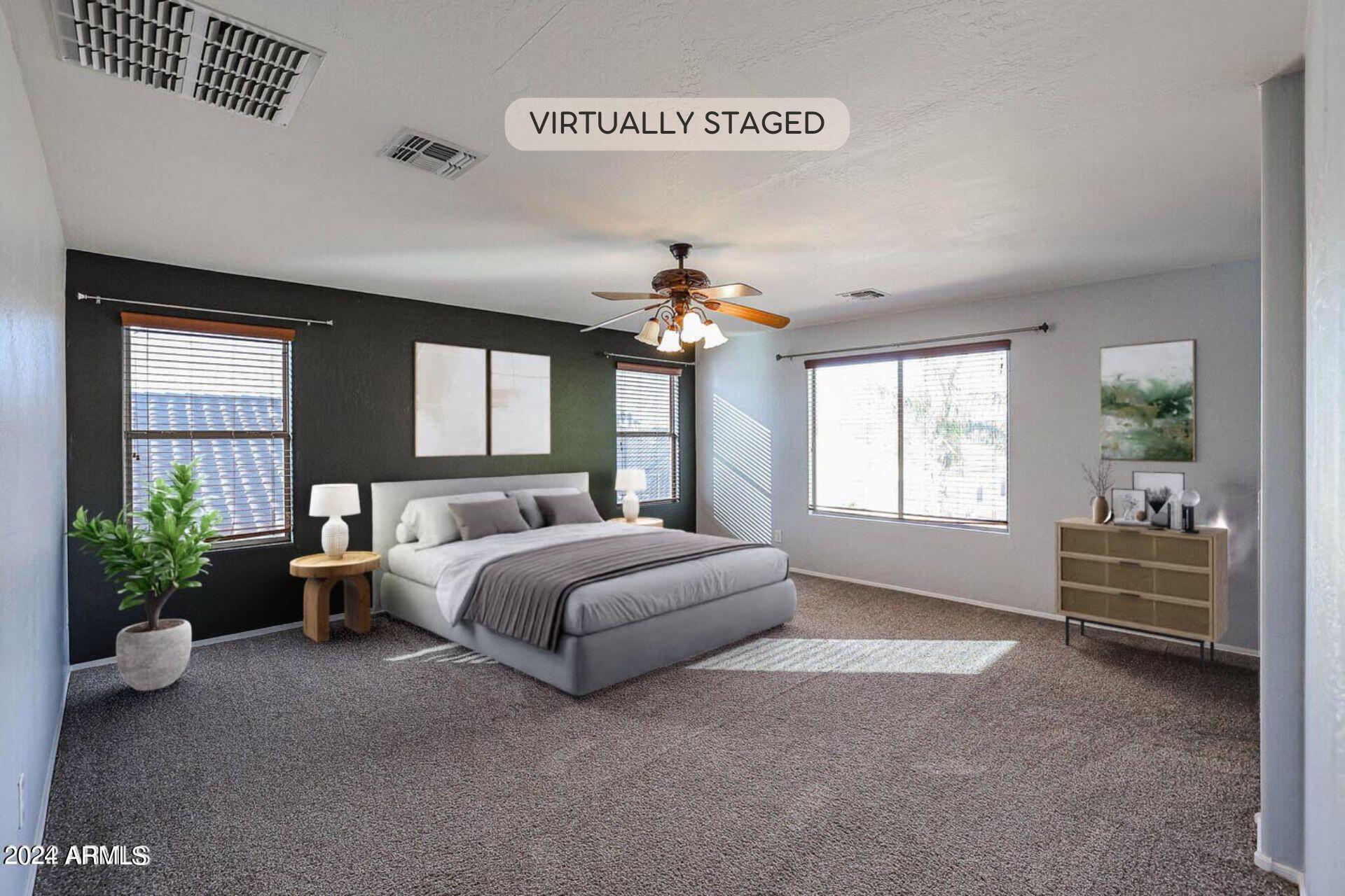 14182 West Boca Raton Road Surprise, AZ 85379 - Photo 21 of 45 Master Bed Staged