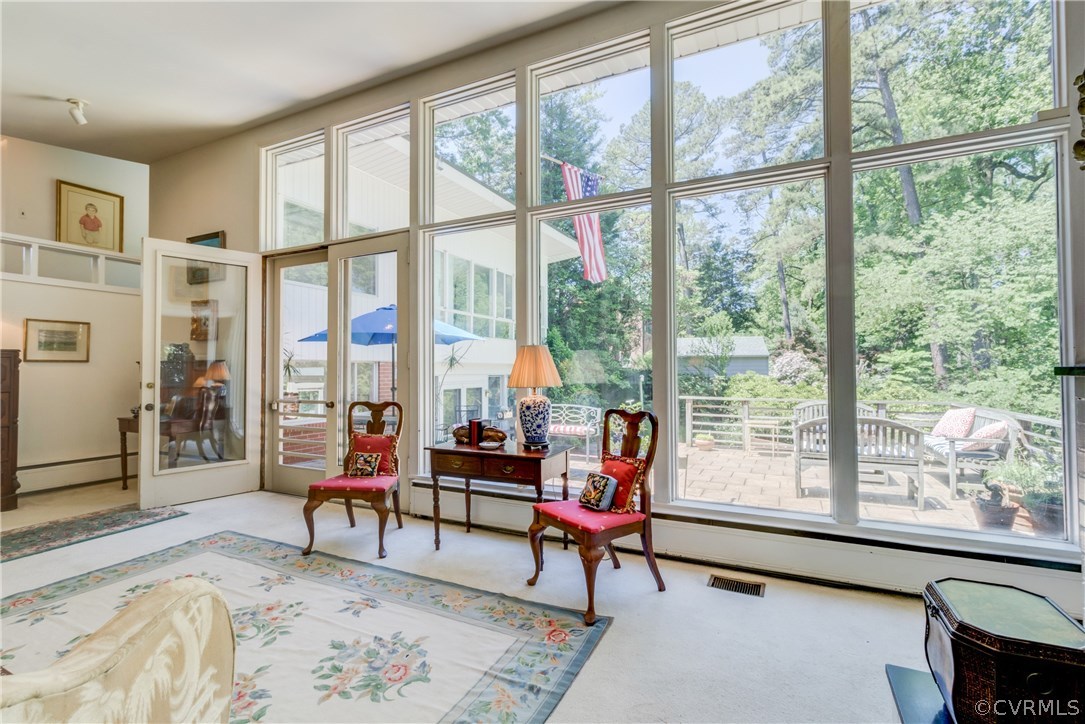 6313 Ridgeway Road Richmond, VA 23226 - Photo 7 of 31 Dramatic floor-to-ceiling windows and doors to upp