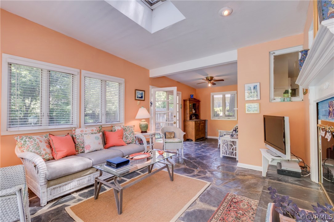 6313 Ridgeway Road Richmond, VA 23226 - Photo 9 of 31 Sunroom with polished slate floor, fireplace and d