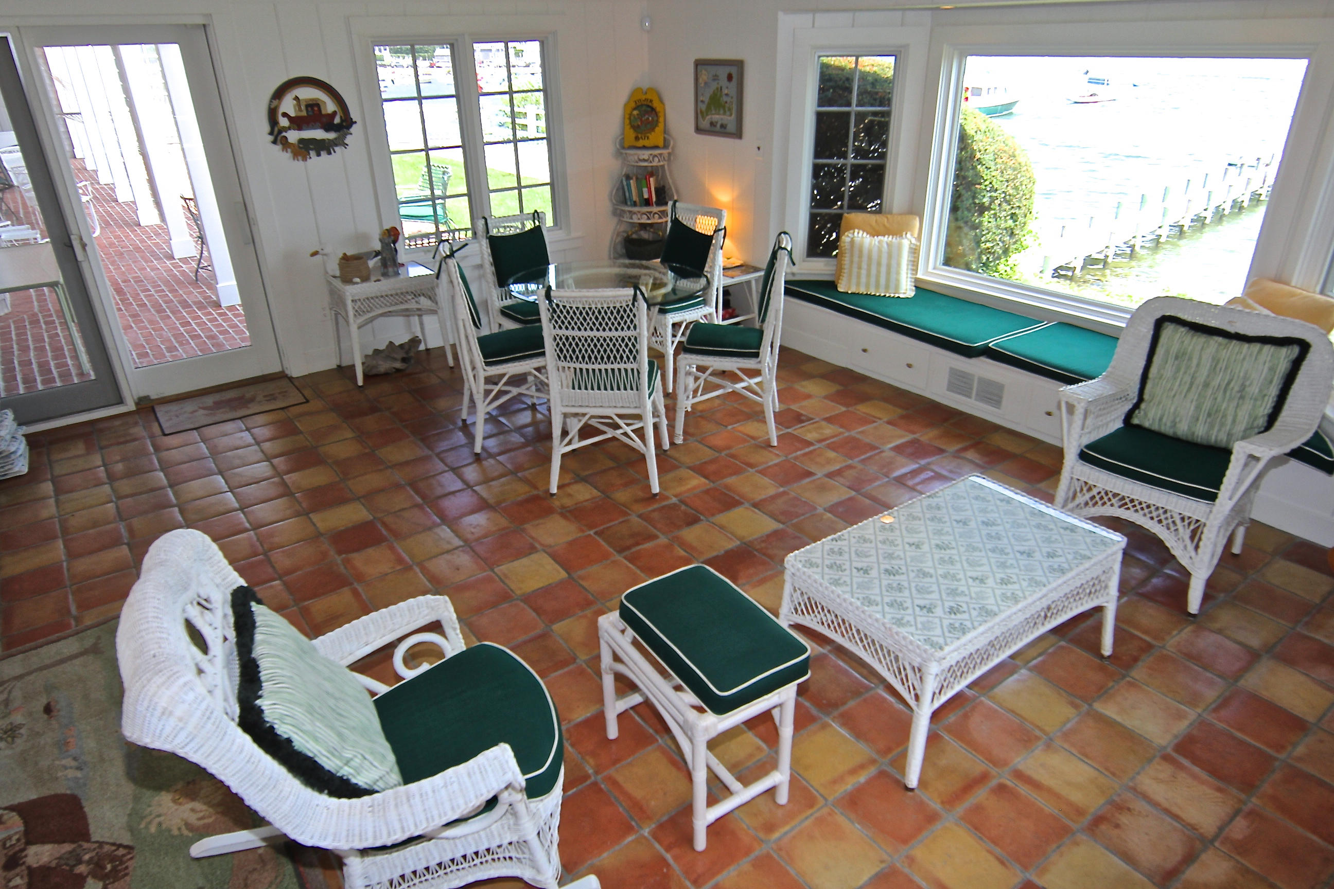 8 Beach Street Edgartown, MA 02539 - Photo 11 of 42 a outdoor space with patio couch and a window