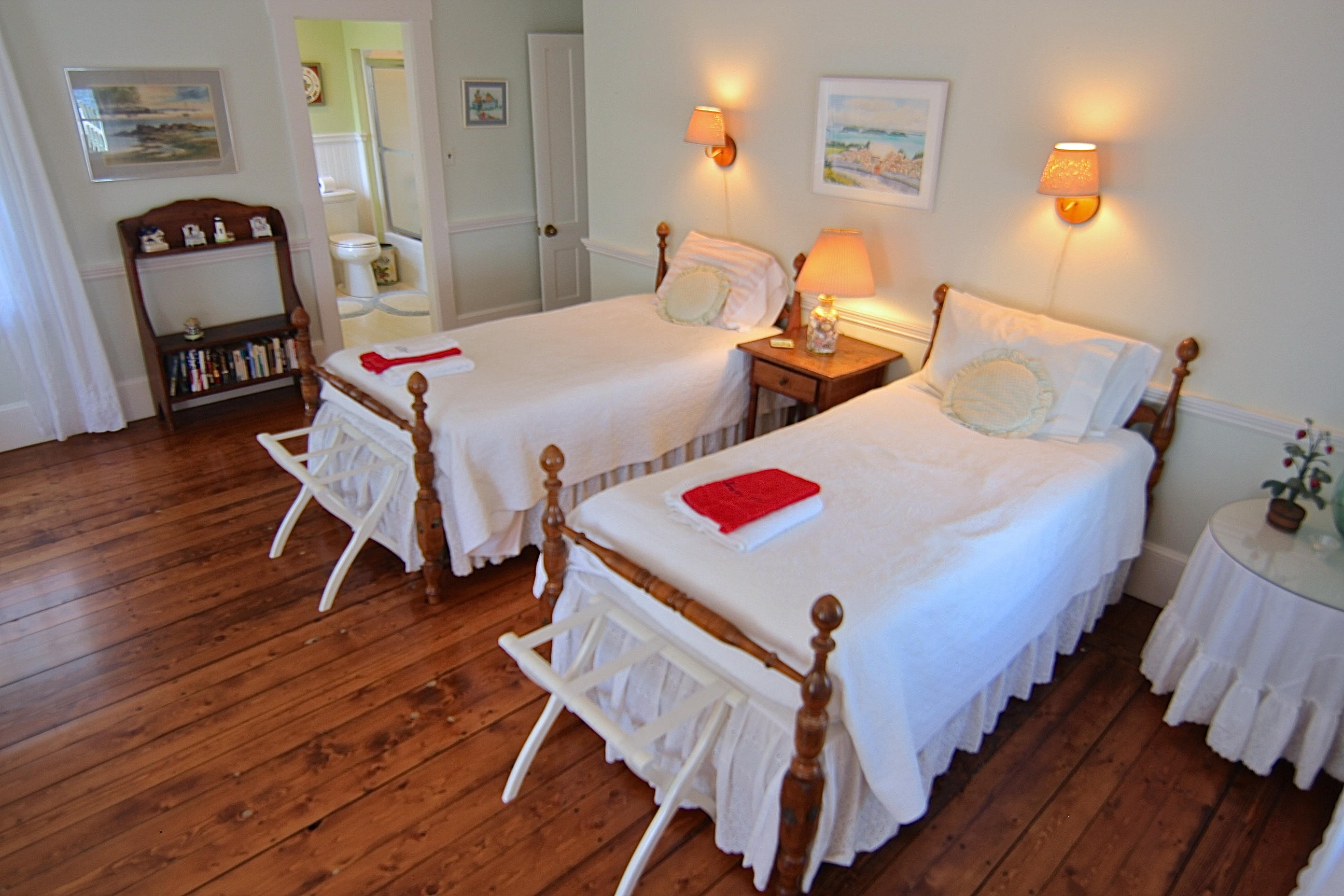 8 Beach Street Edgartown, MA 02539 - Photo 18 of 42 a bed room with two beds and a chair
