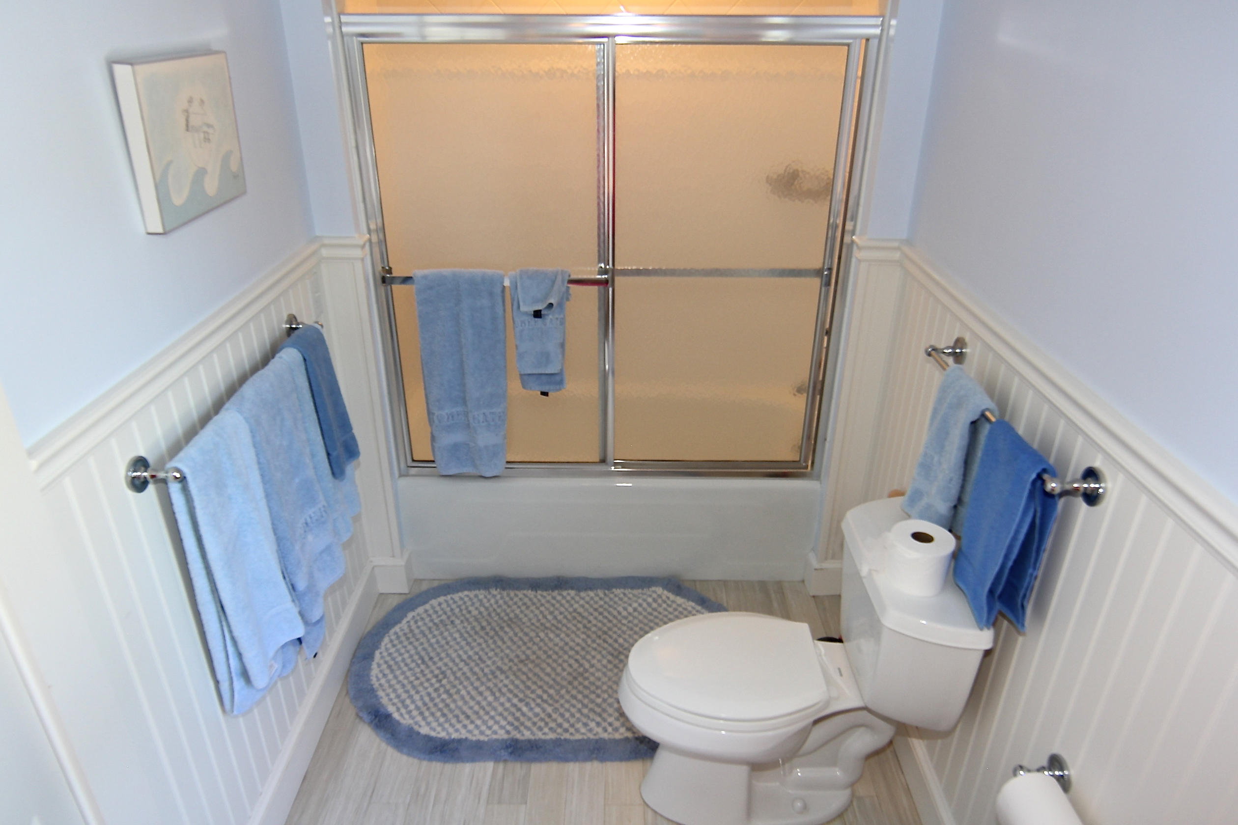 8 Beach Street Edgartown, MA 02539 - Photo 21 of 42 a bathroom with a sink toilet and shower