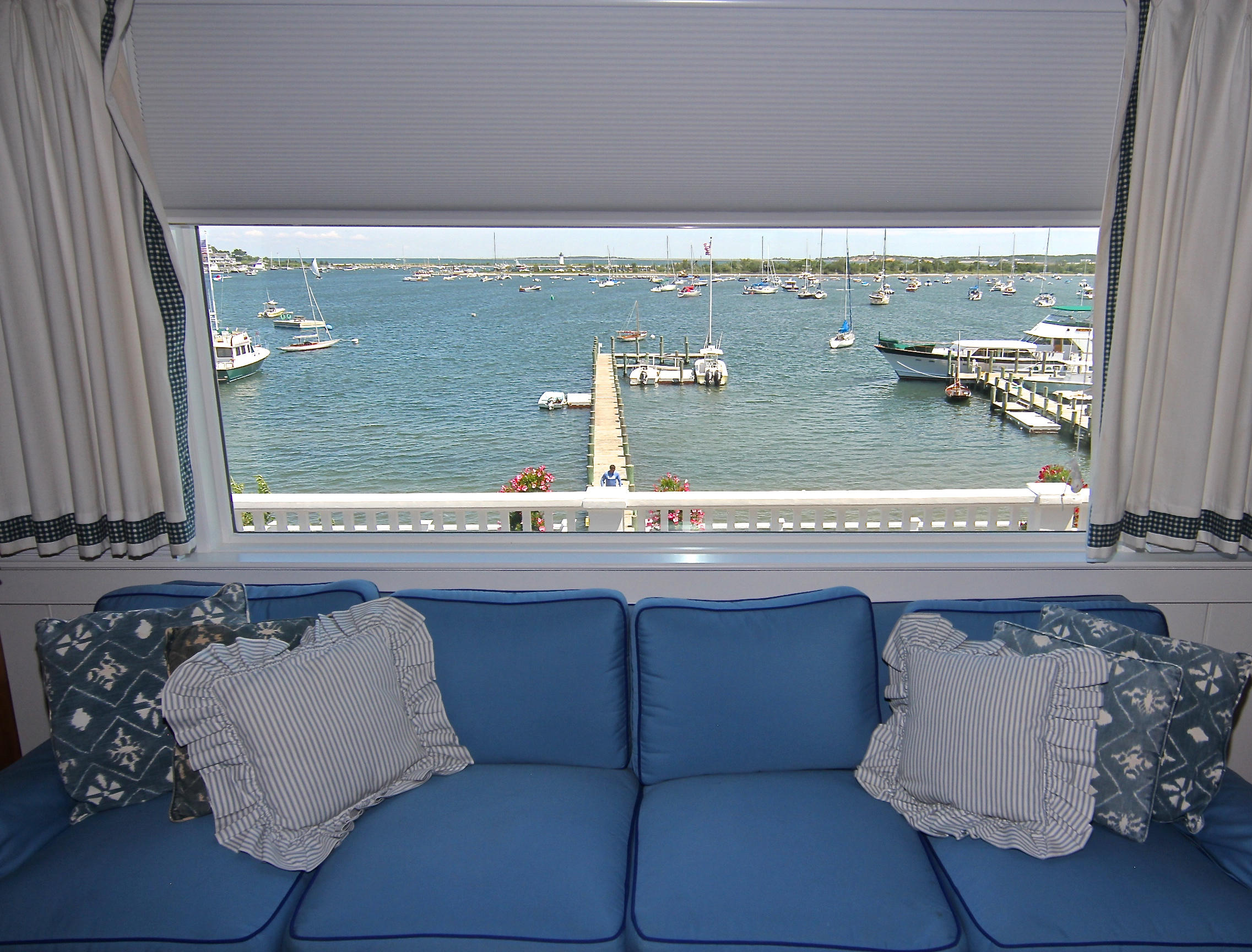8 Beach Street Edgartown, MA 02539 - Photo 22 of 42 a bathroom with a sink and a mirror