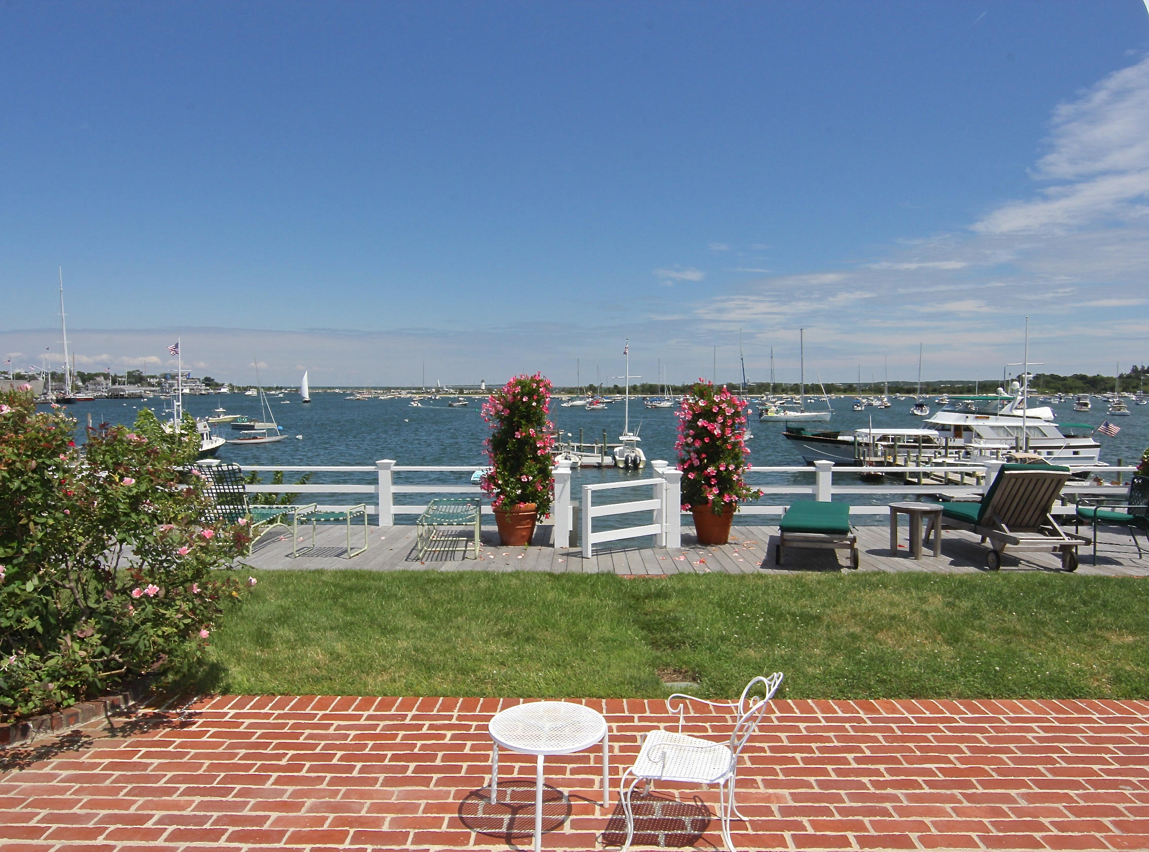 8 Beach Street Edgartown, MA 02539 - Photo 36 of 42 a view of a golf course with chairs