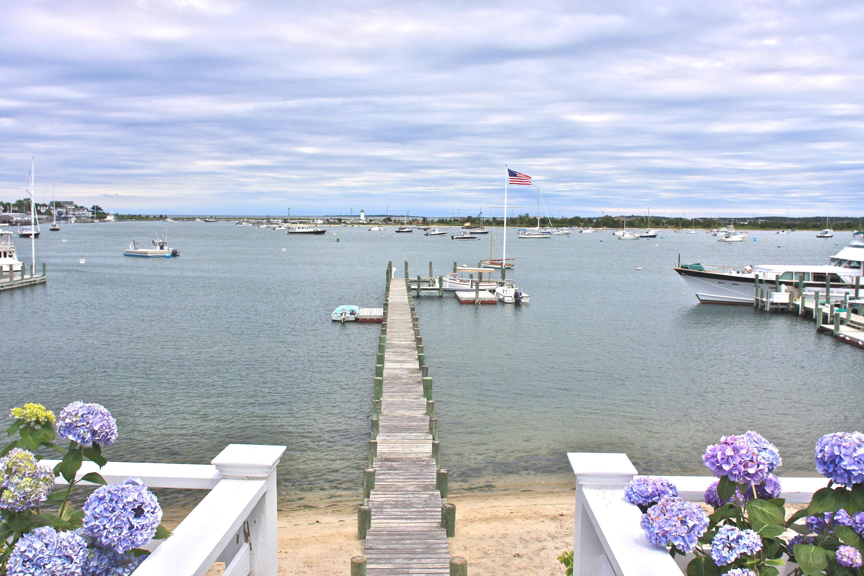 8 Beach Street Edgartown, MA 02539 - Photo 4 of 42 a view of a lake with couches