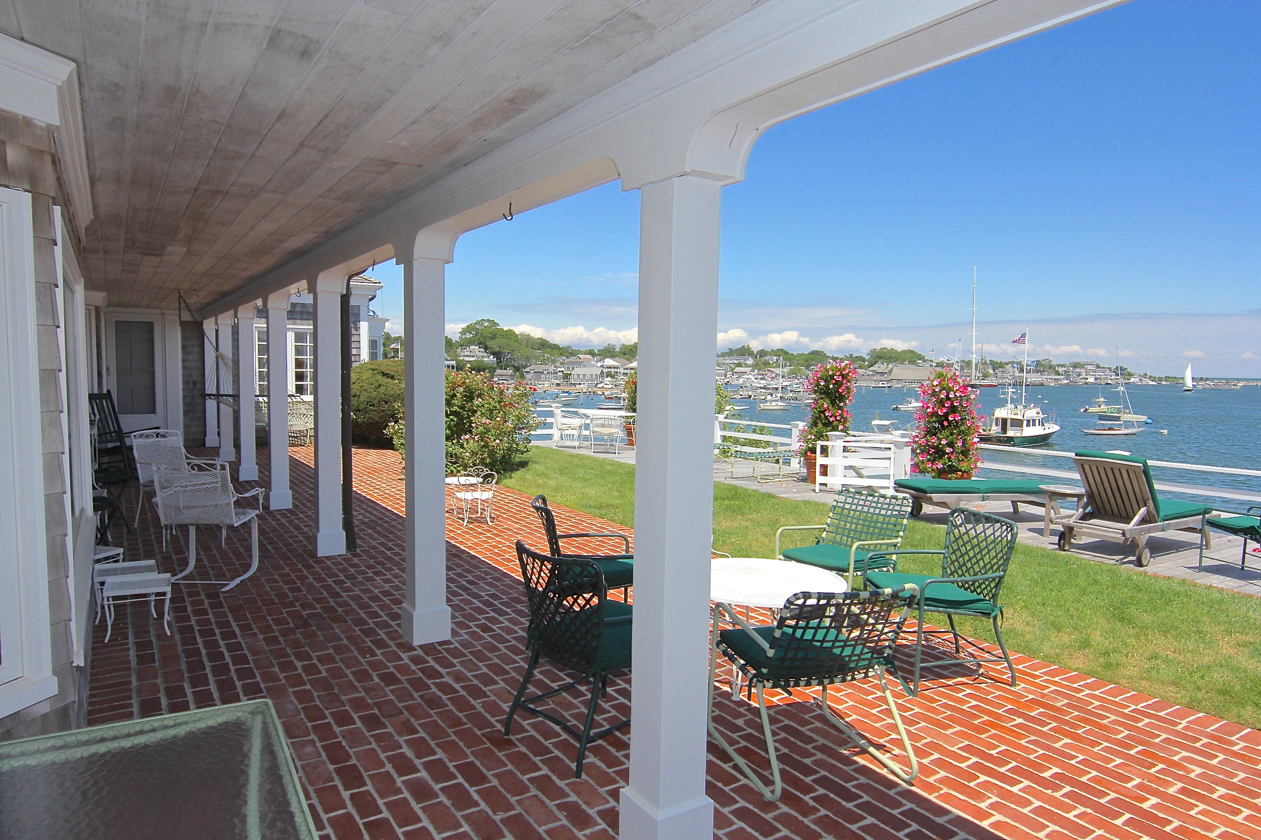8 Beach Street Edgartown, MA 02539 - Photo 5 of 42 a view of a balcony with lake view