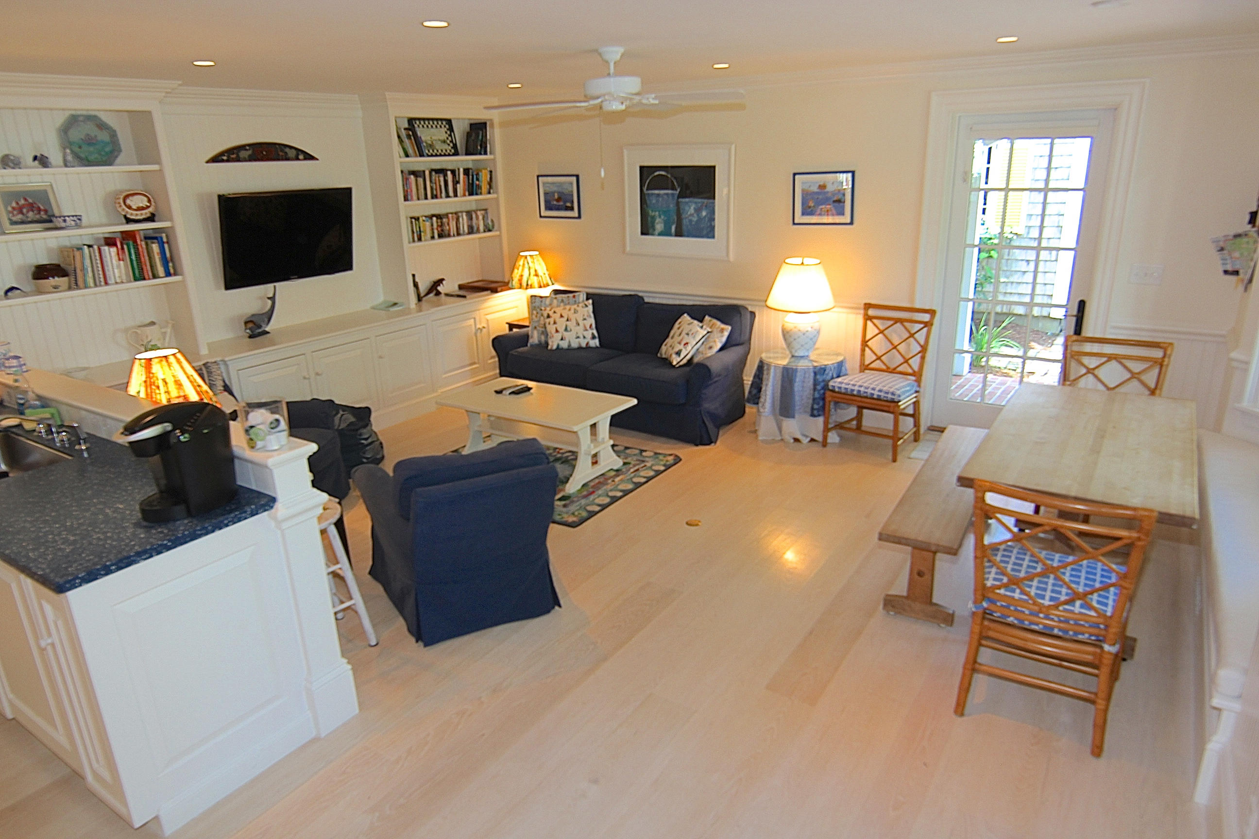 8 Beach Street Edgartown, MA 02539 - Photo 9 of 42 a living room with furniture and a flat screen tv