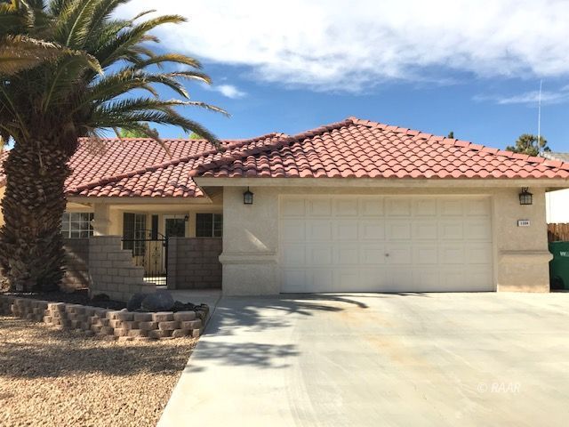 1204 Jennifer Court Ridgecrest, CA 93555 - Photo 1 of 1 a front view of a house
