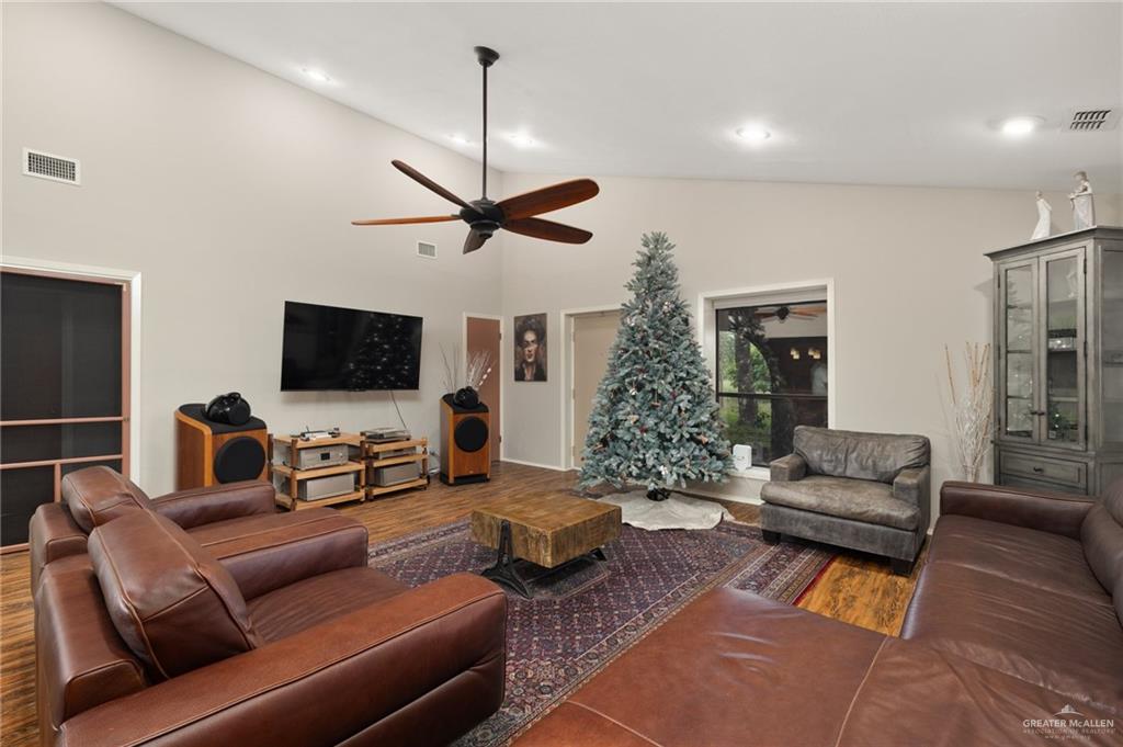 492 West Trenton Road Donna, TX 78537 - Photo 8 of 20 a living room with furniture and a flat screen tv