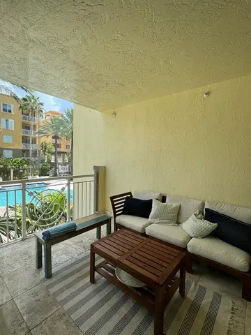 a bench sitting on top of a wooden floor