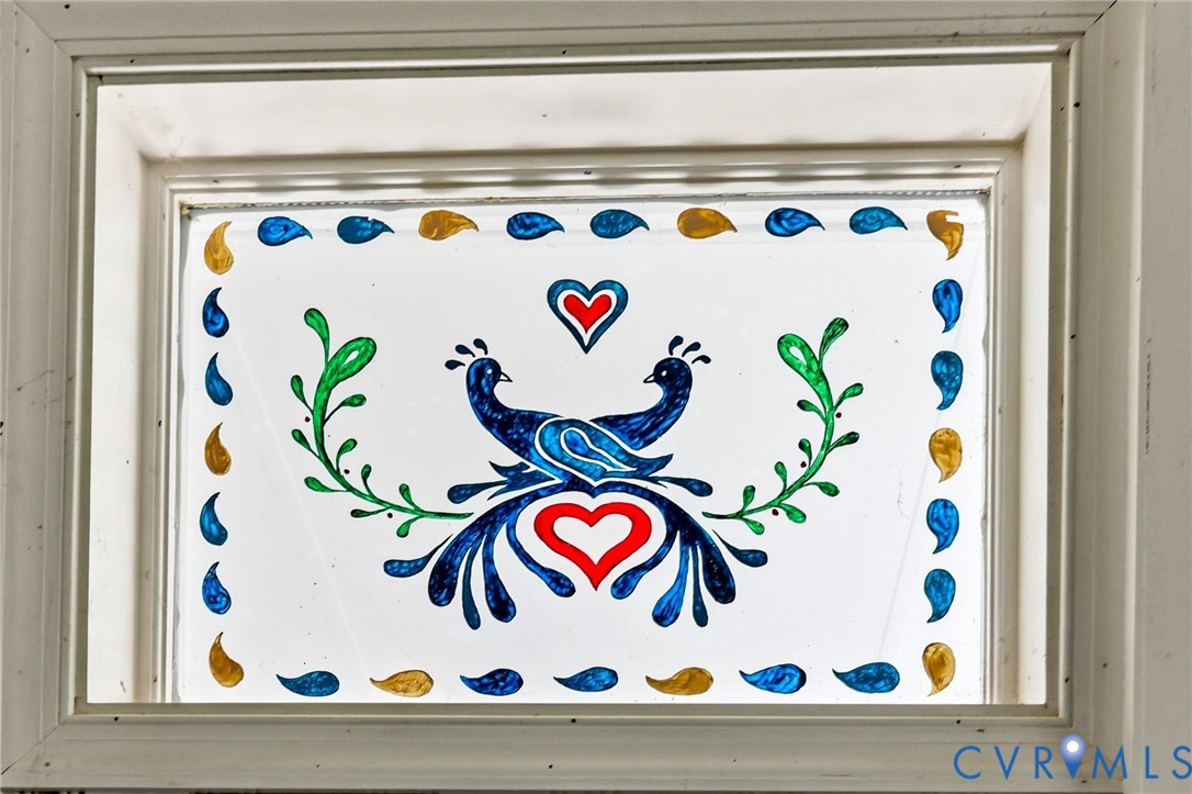 3400 Warner Road Richmond, VA 23225 - Photo 26 of 33 Decorative hand painted glass panel with a vibrant