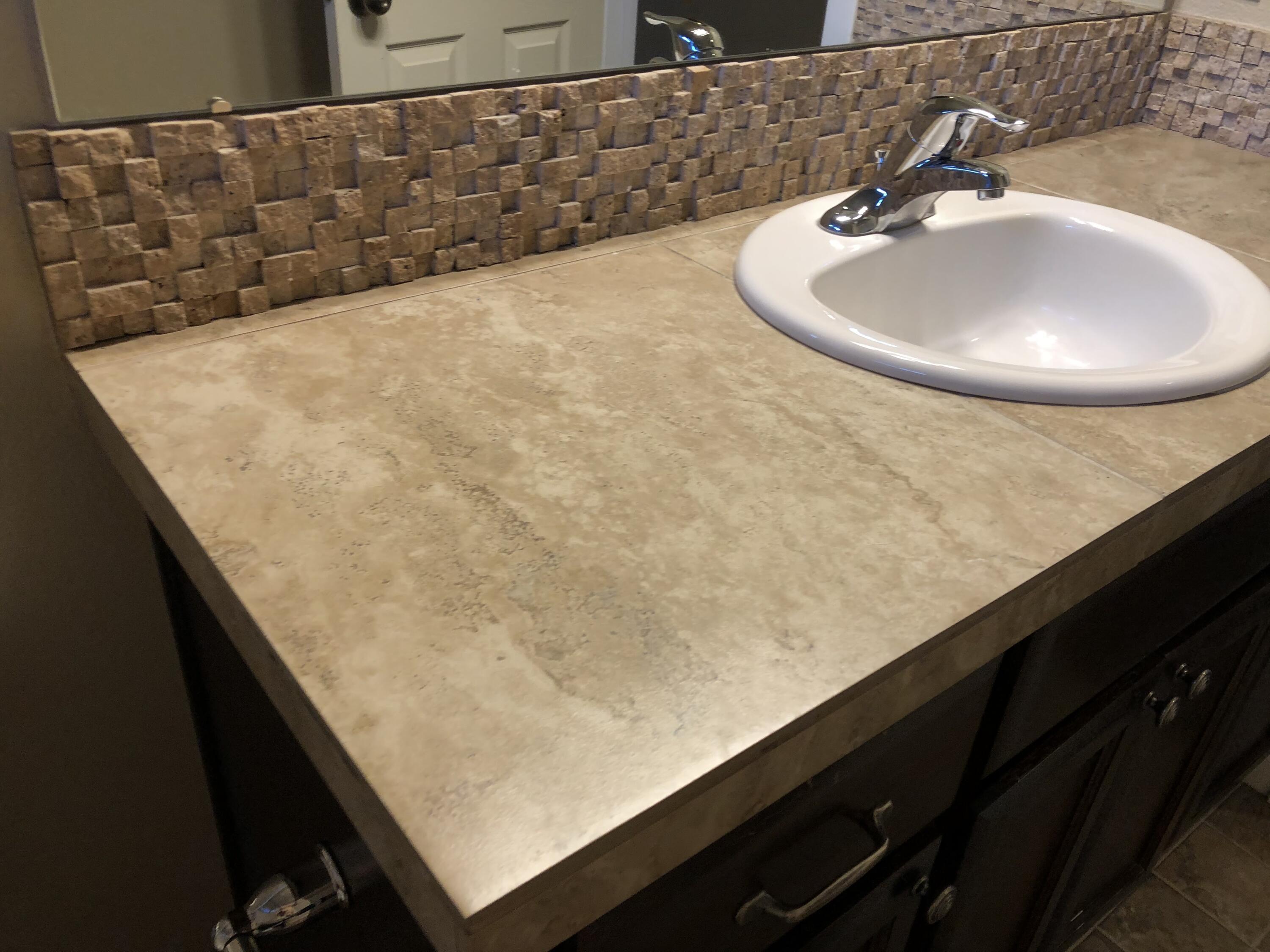 682 Southeast Reed Market Road Bend, OR 97702 - Photo 9 of 16 Bathroom counters tile