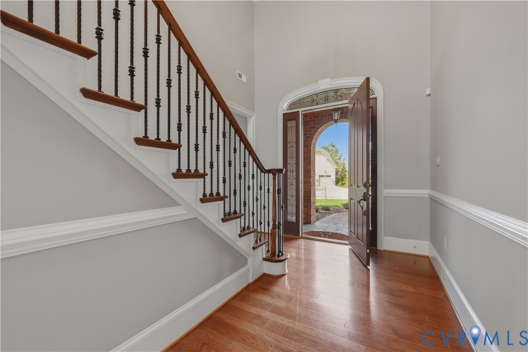 453 Bel Bridge Circle Midlothian, VA 23113 - Photo 5 of 39 Beautiful wood floors and stairway.