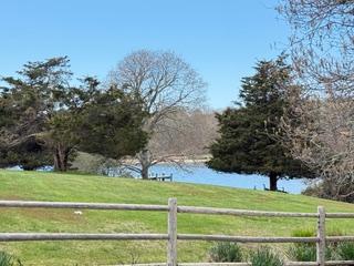 82 Oyster Pond Road Edgartown, MA 02539 - Photo 33 of 53 a view of a golf course with a big yard