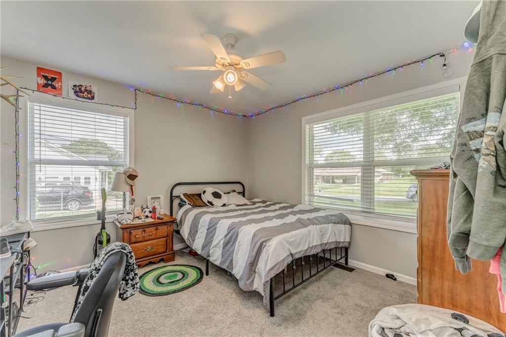 109 Lake Street Rockmart, GA 30153 - Photo 31 of 50 a bedroom with a bed and a window