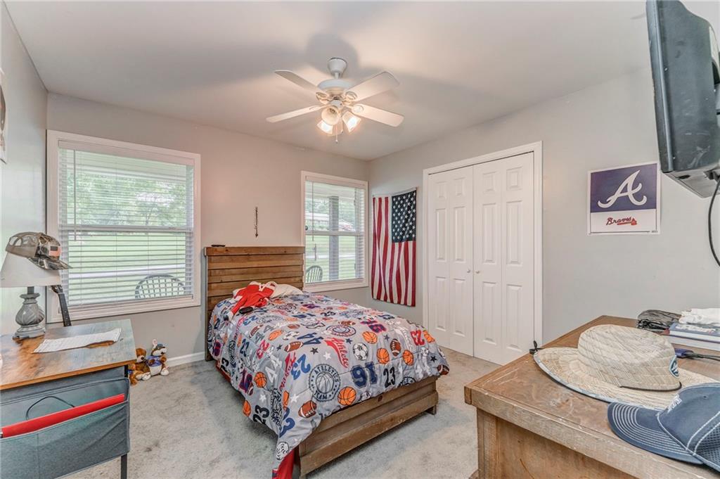 109 Lake Street Rockmart, GA 30153 - Photo 35 of 50 a bedroom with bed and a window