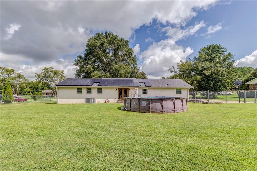 109 Lake Street Rockmart, GA 30153 - Photo 46 of 50 front view of house with a garden and trees