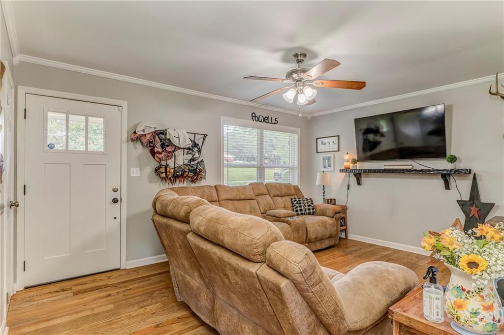 109 Lake Street Rockmart, GA 30153 - Photo 9 of 50 a living room with furniture and a flat screen tv