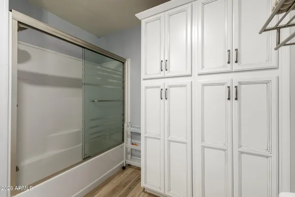 a kitchen with sink cabinets and stove