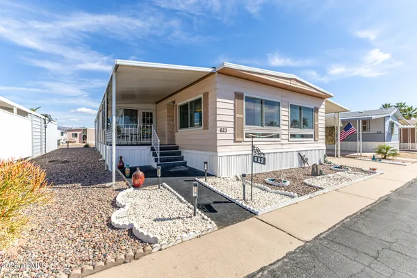 a view of a house with lounge chair