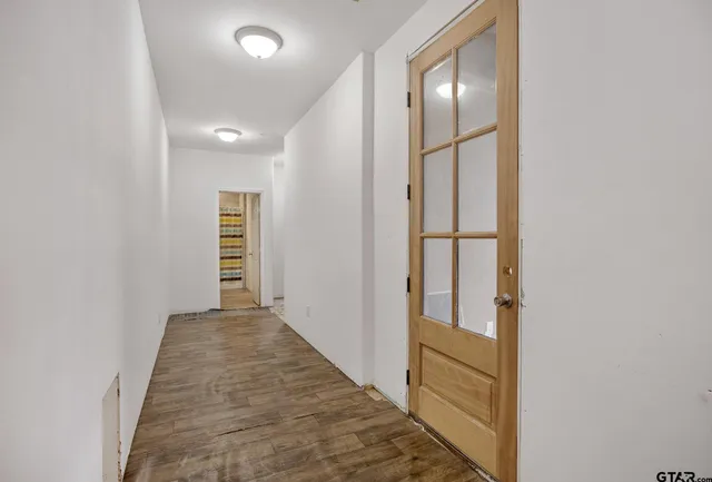 an entryway with a glass door