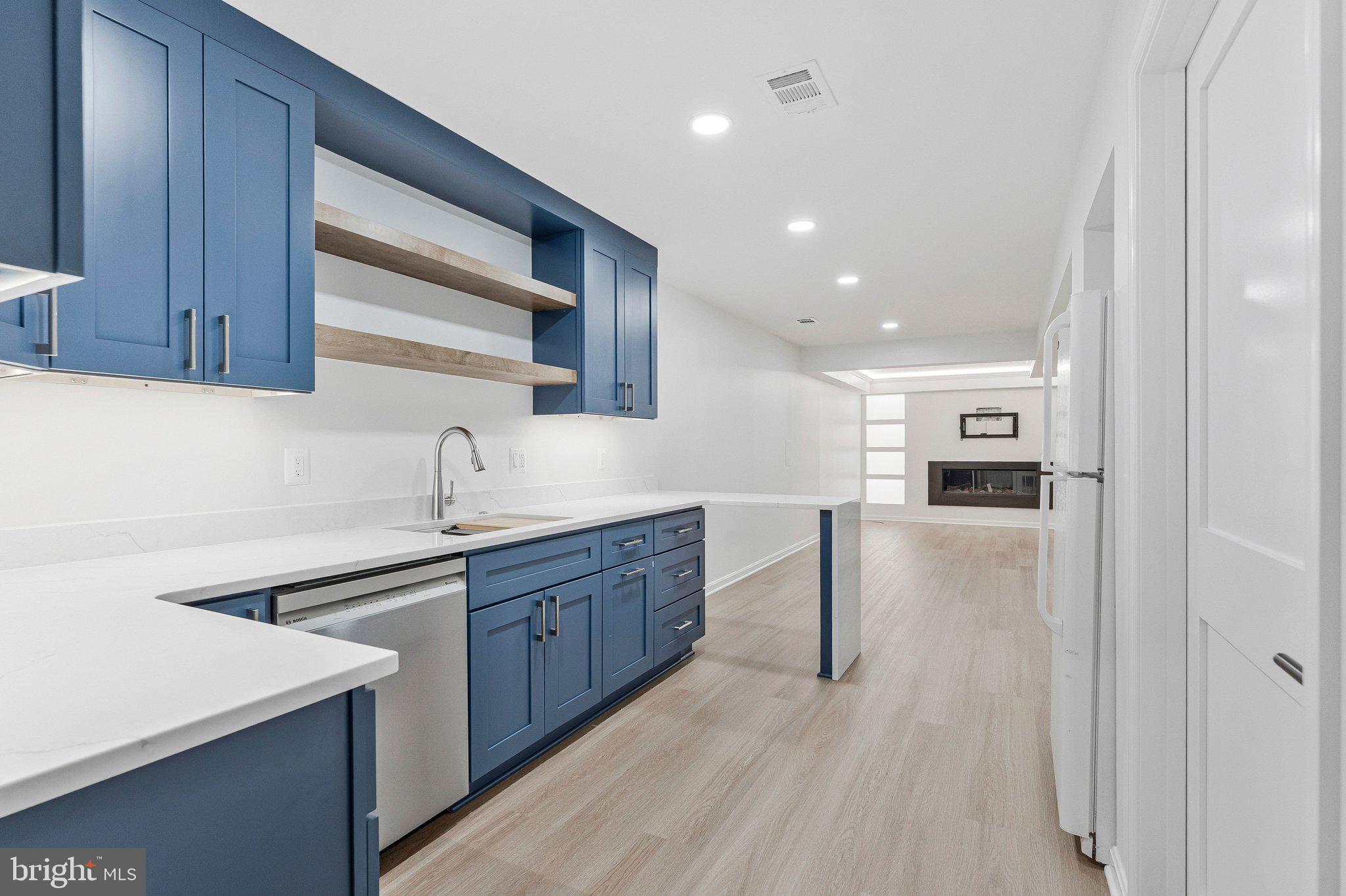 7730 Falstaff Road McLean, VA 22102 - Photo 55 of 83 Wet bar and family room