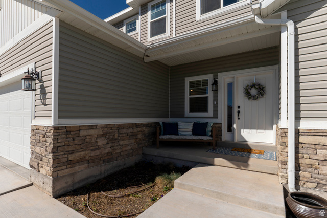 836 South 250 West Vernal, UT 84078 - Photo 4 of 56 Entrance to property featuring stone siding and covered porch