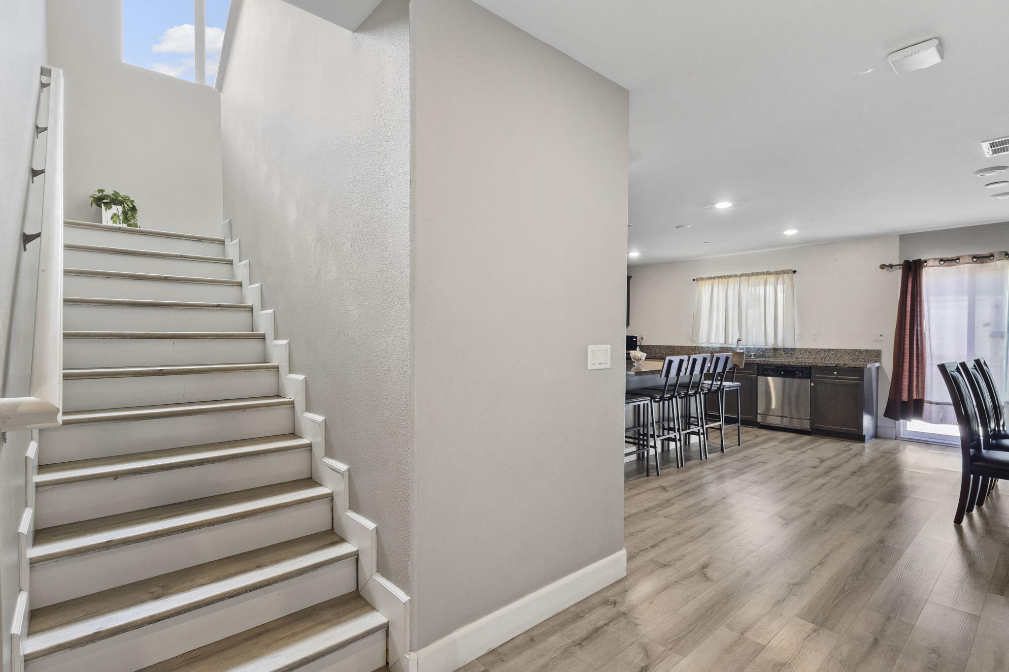 32486 Roman Warren Way Winchester, CA 92596 - Photo 20 of 45 a view of entryway and hall with wooden floor
